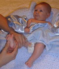 Infant massage leg