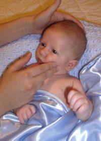 Infant massage face